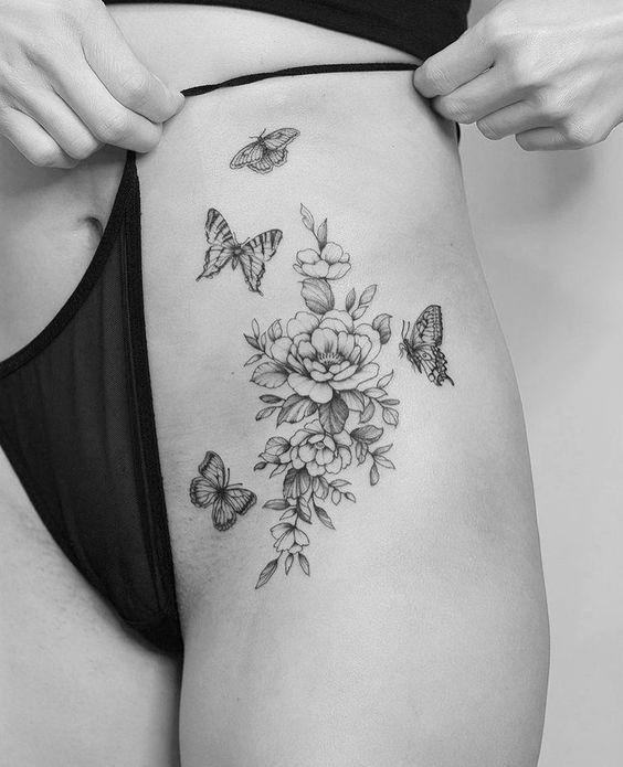 tatuagem-de-borboleta-com-flores Tatuagem de Borboleta com Flores