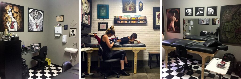 Estúdio de tatuagem aconchegante com artistas em ação e decoração artística nas paredes.ambiente criativo e profissional.