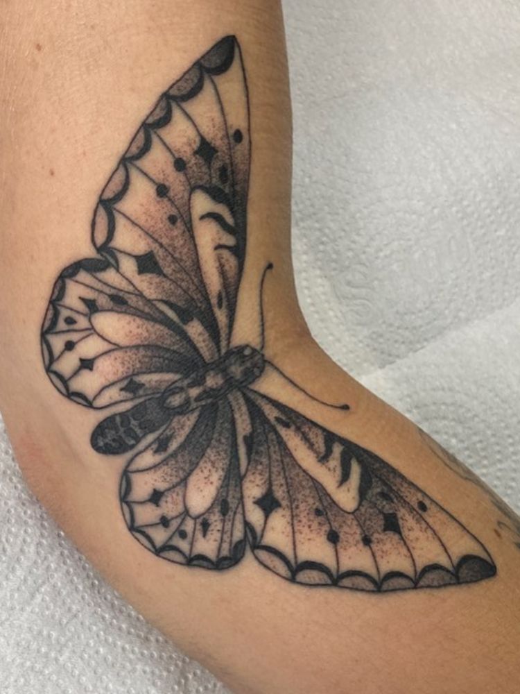 imagem-22 Foto de tatuagem de borboleta no braço.