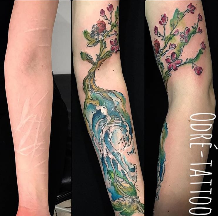 tatuagem cobre cicatriz grande nos bracos 0258