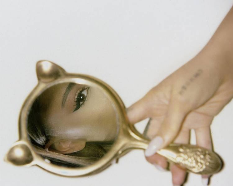 Foto de tattoo da cantora.